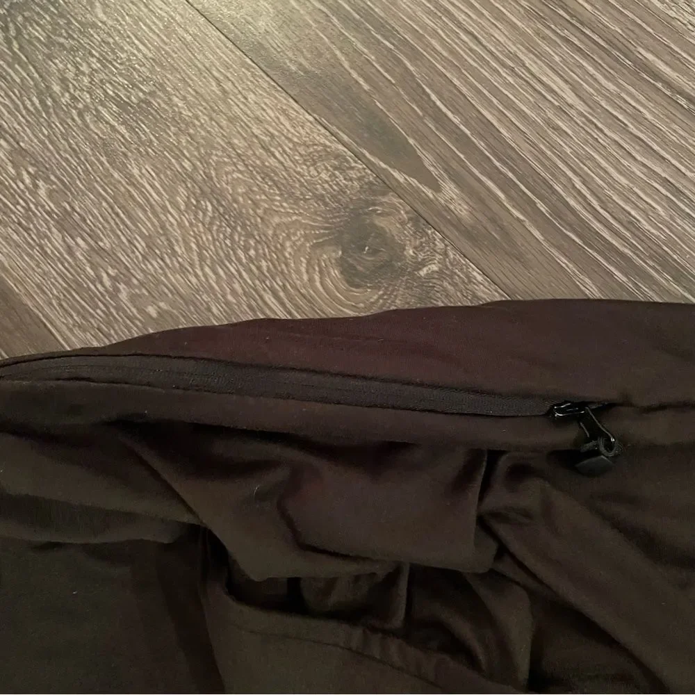 Beyond yoga infinity scarf with hidden zipper pocket